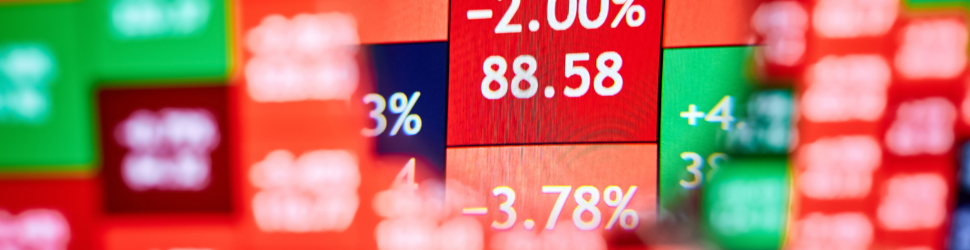 A trader looking at a stock heatmap through a magnifying glass